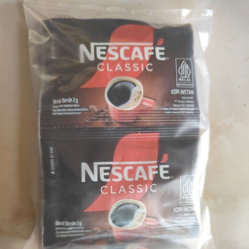 

Nescafe classic kopi murni 100℅ isi 10 sachet nescafe clasik