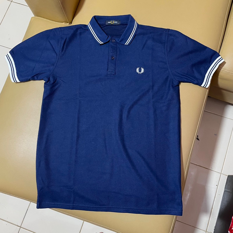 Preloved Kaos Polo Fred Perry Navy Lis Putih