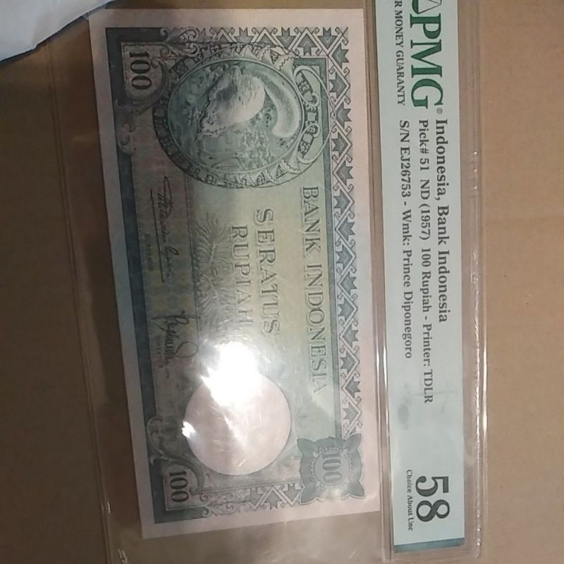 100 rp tupai 1957 pmg 58 polos