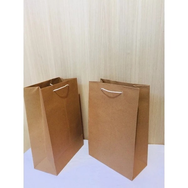 

PAPER BAG COLKLAT ALL SIZE / TAS HAMPERS KADO / PAPER BAG TALI BAHAN KRAFT TEBAL / KANTONG SOUVENIR / GOODIE KRAFT
