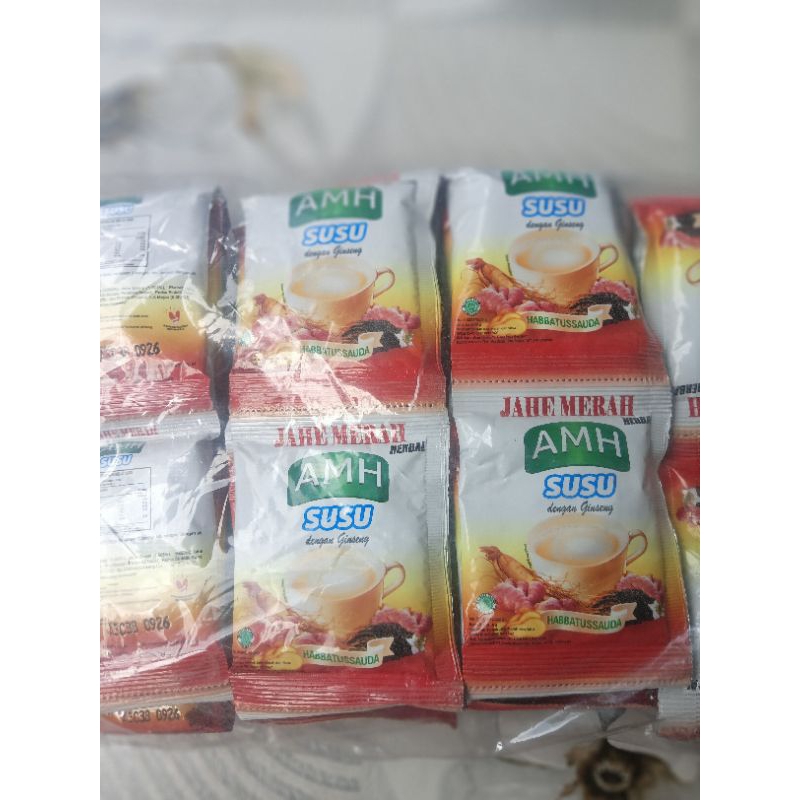 

(1 Renteng 10 Sachet)Jahe Merah Herbal AMH Susu Dengan Gingseng Dan Habbatussauda