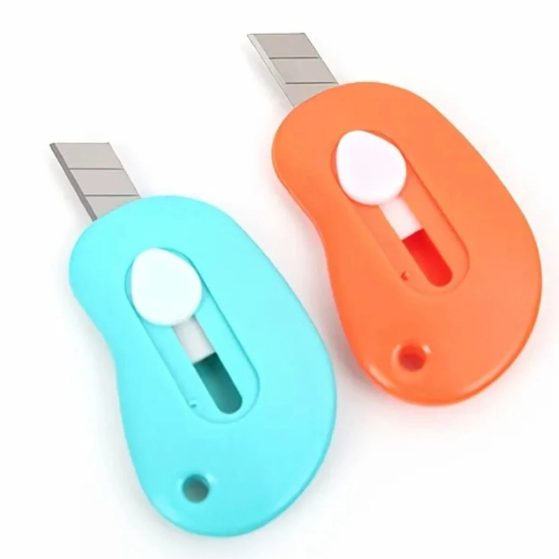 

Cutter Mini Polos Travel Kit Pembuka Paket Pemotong Kertas