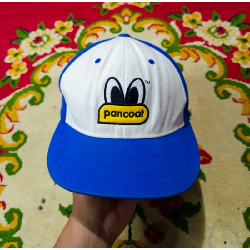 TOPI PANCOAT