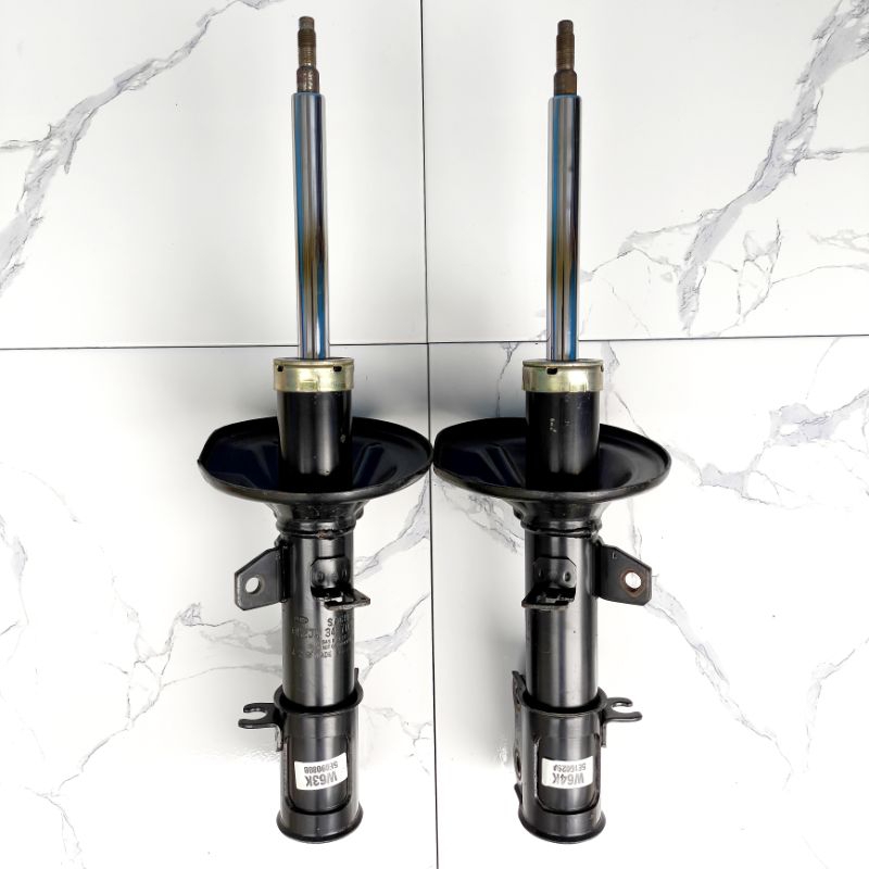 shock kia carens 2 depan