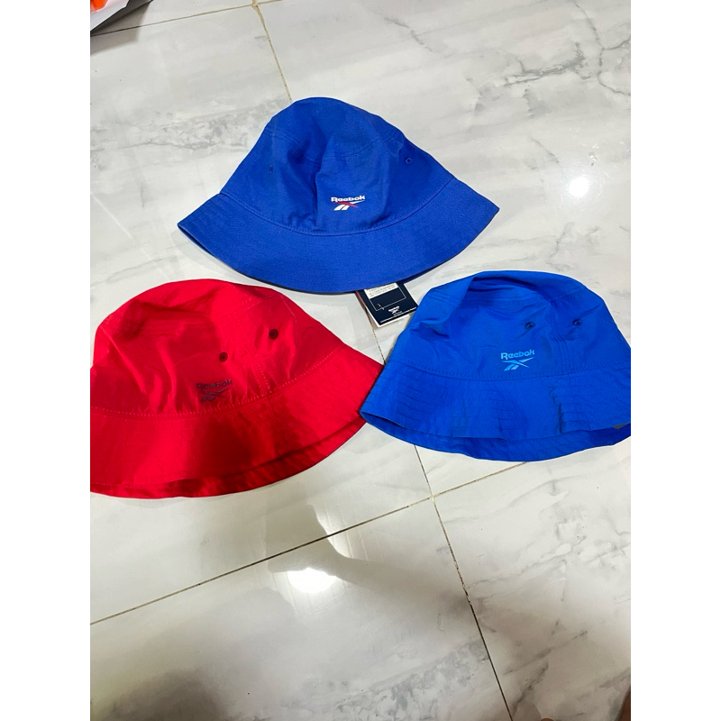 Topi bucket hat parasut/ katun Reebok biru dan merah sale 80% original sport station