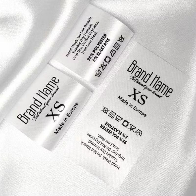

satin putih uk 2,5 cm custom logo/atau nama tulisan,label saran pencucian,label washing