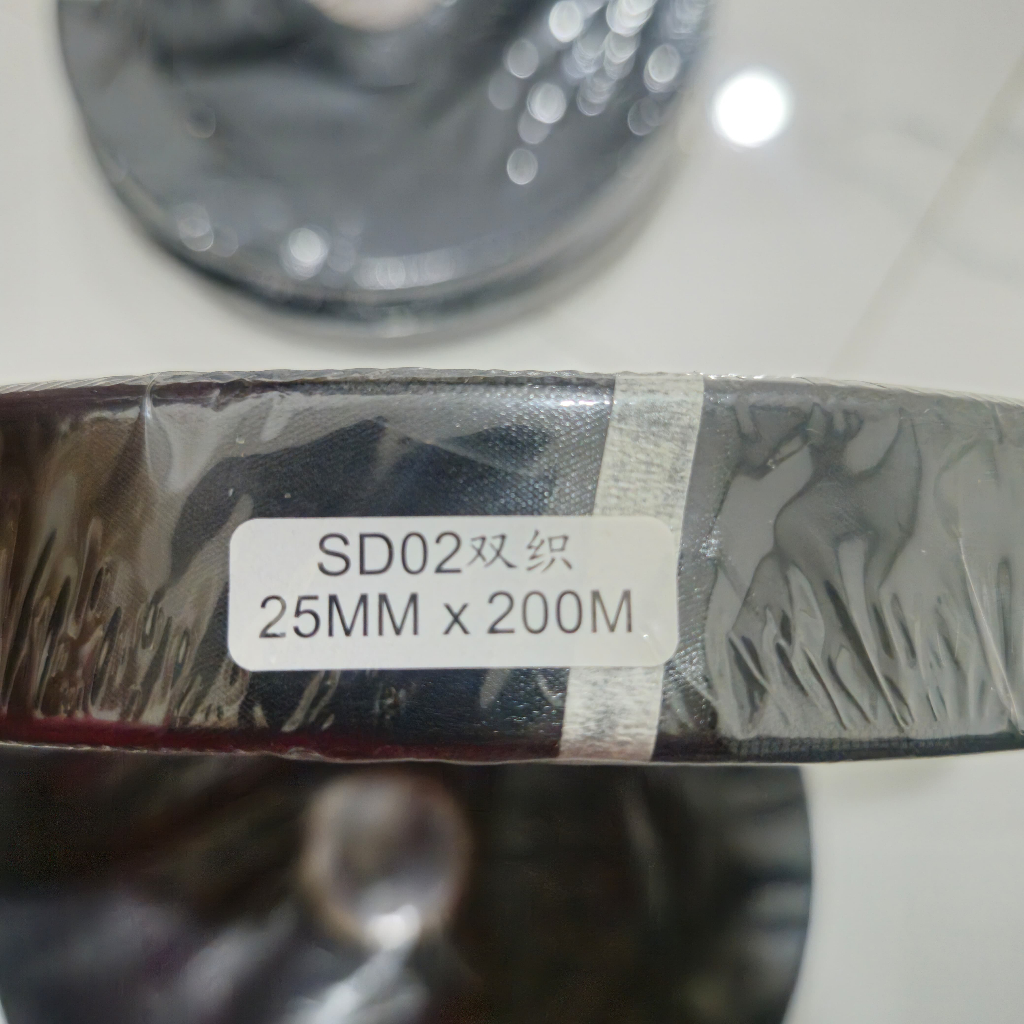 

Label Pita Satin Rajut uk 25mm x 200m 2 sisi warna hitam /satin import/label satin Rajut/ double woven edge