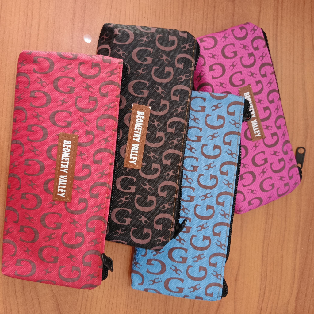 

Tepak / Tempat Pensil Resleting Kain Model Perahu Gucci