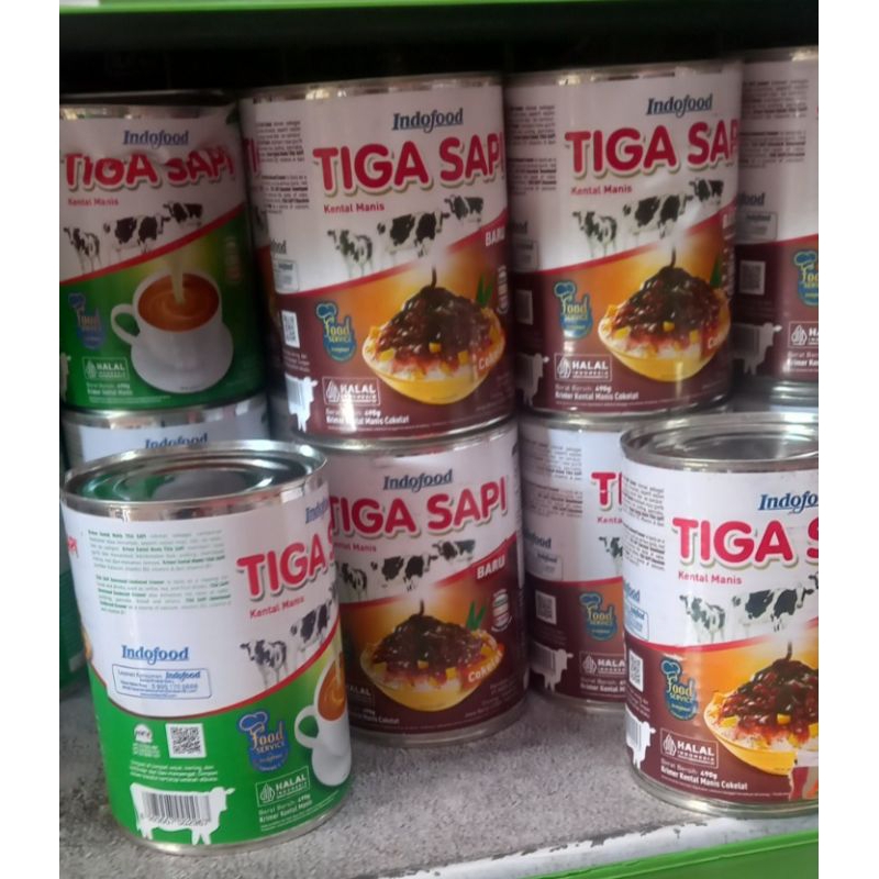 

susu kental manis-tiga sapi-coklat-putih-500gr-kalengan