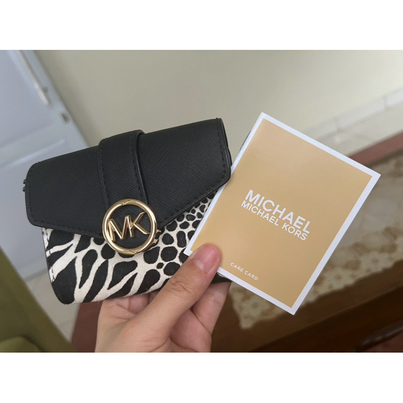 dompet MK
