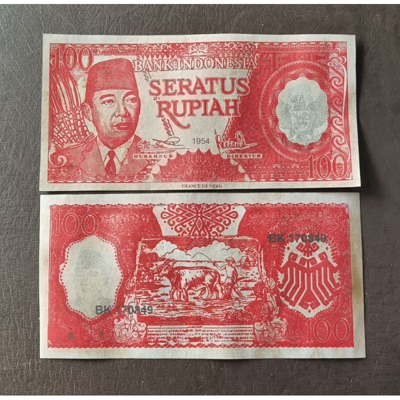 Uang souvenir Sukarno melengkung pecahan 100 rupiah tahun 1954 France de nero nyala UV Sukarno & UV 