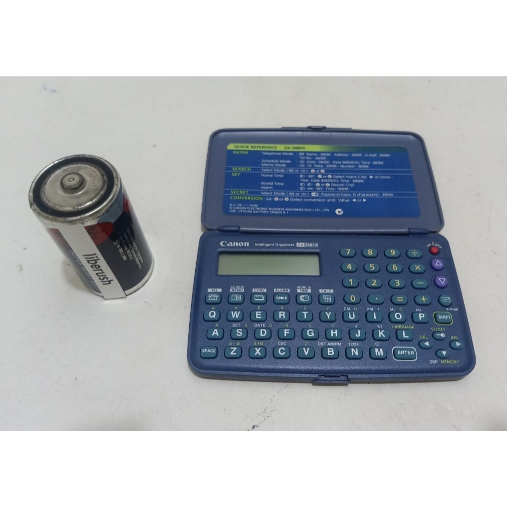 

vintage Canon intelligent organizer ZX-388Hi digital calculator numeric keypad 65kb ram memory data alfalink