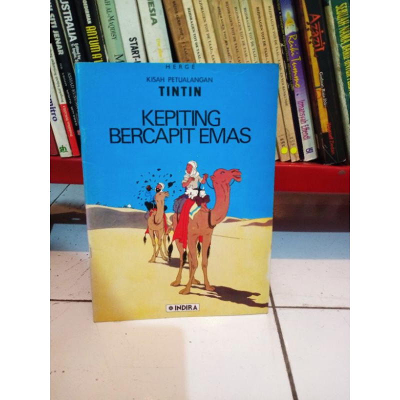 

Tintin Kepiting Bercapit emas