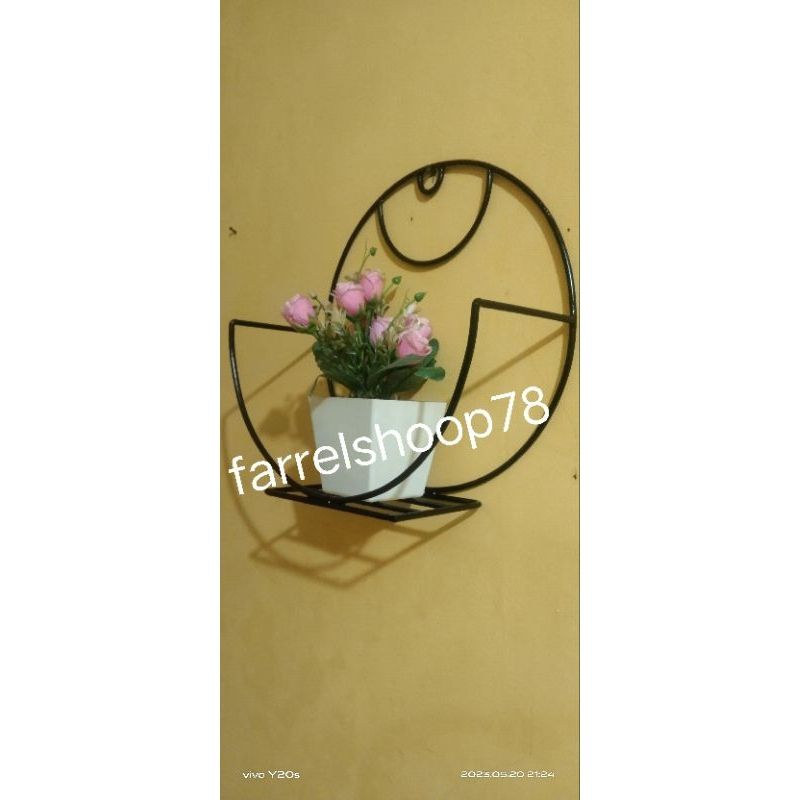 rak bunga dinding besi