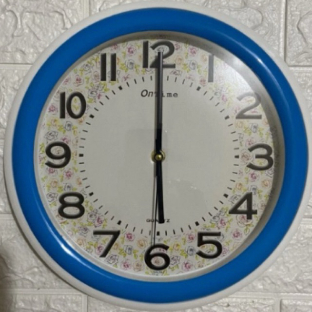Jam dinding Bulat Corak Bunga Ontime 767