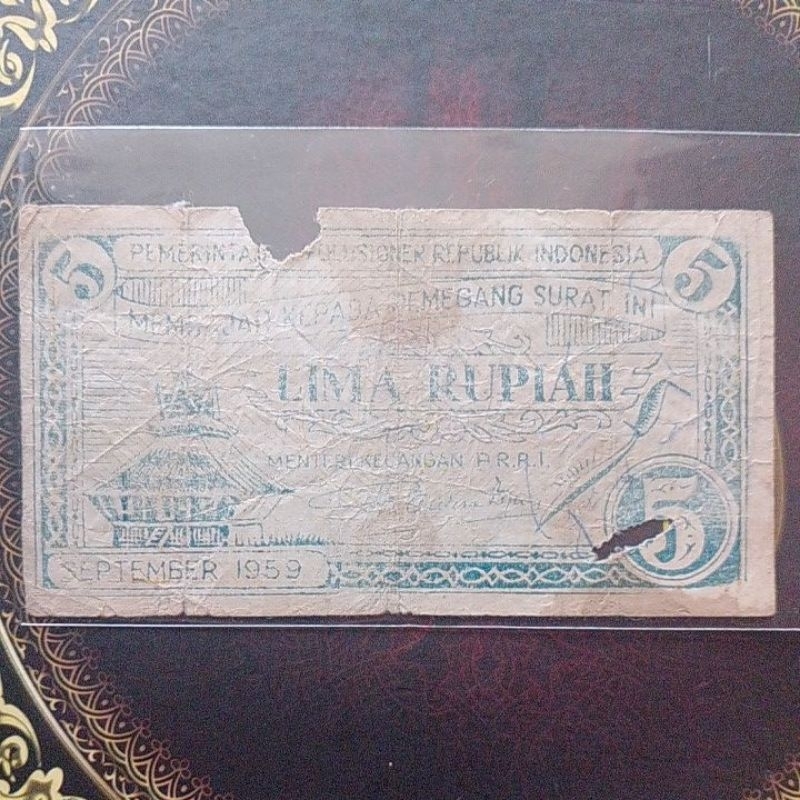 Uang PRRI Permesta 5 rupiah 1959 fine bolong