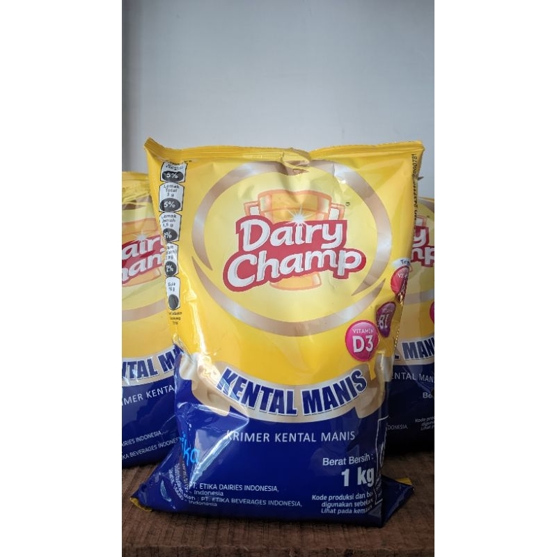 

BarokahGrosir77-Dairy Champ Refill/Bantal 1Kg Krimer kental Manis