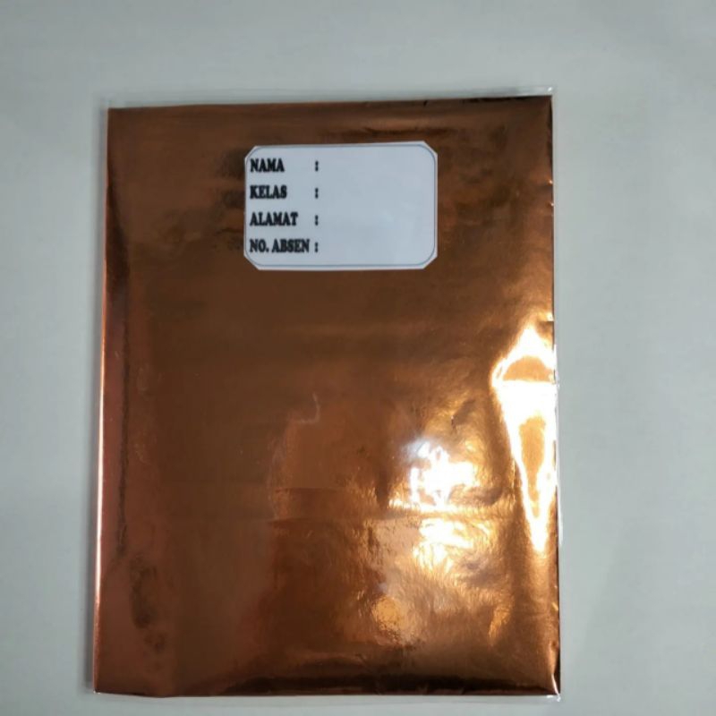 

buku tulis sudah disampul sukung warna oren gilap dan sampul plastik