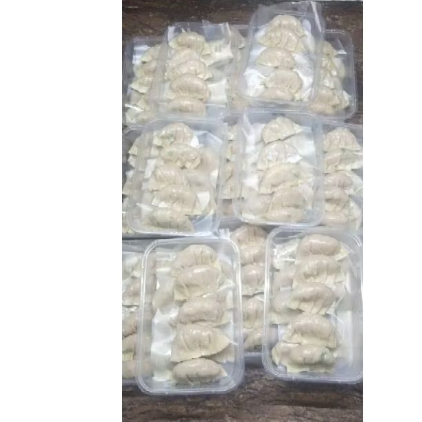 

pangsit ayam Frozen/goreng/rebus/kulit bulat/halal