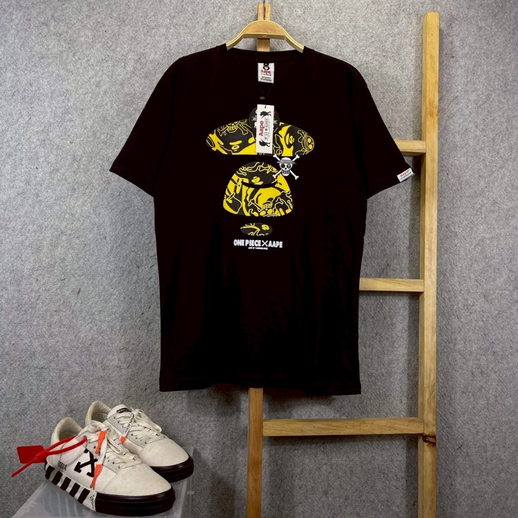 BAJU KAOS T-SHIRT BAPE AAPE BY A BATHING APE X ONE PIECE HEAD YELLOW ON BLACK