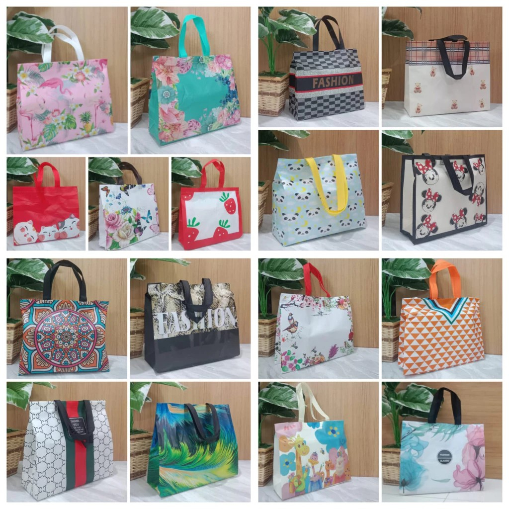 

GOODIE BAG LAMINASI KUAT TAHAN AIR/TAS SPUNBOND LAMINASI MOTIF PREMIUM/TAS SOUVENIR WEDDING