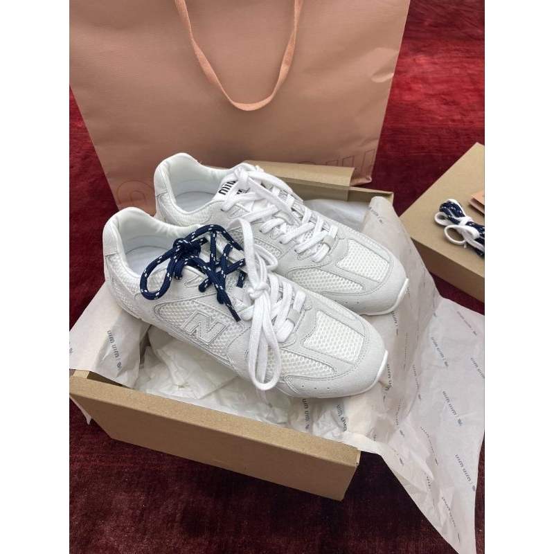 Sepatu M1u x NB 530 SL Leather Sneakers in white