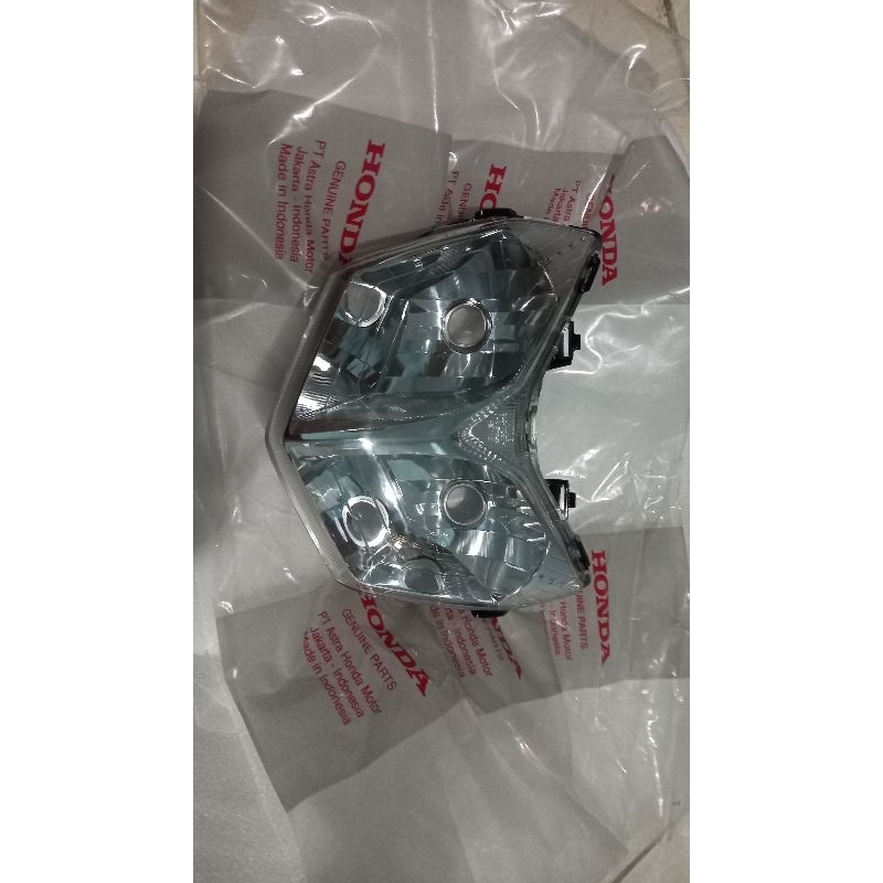 Reflektor depan lampu supra 125 33110 KVL N01
