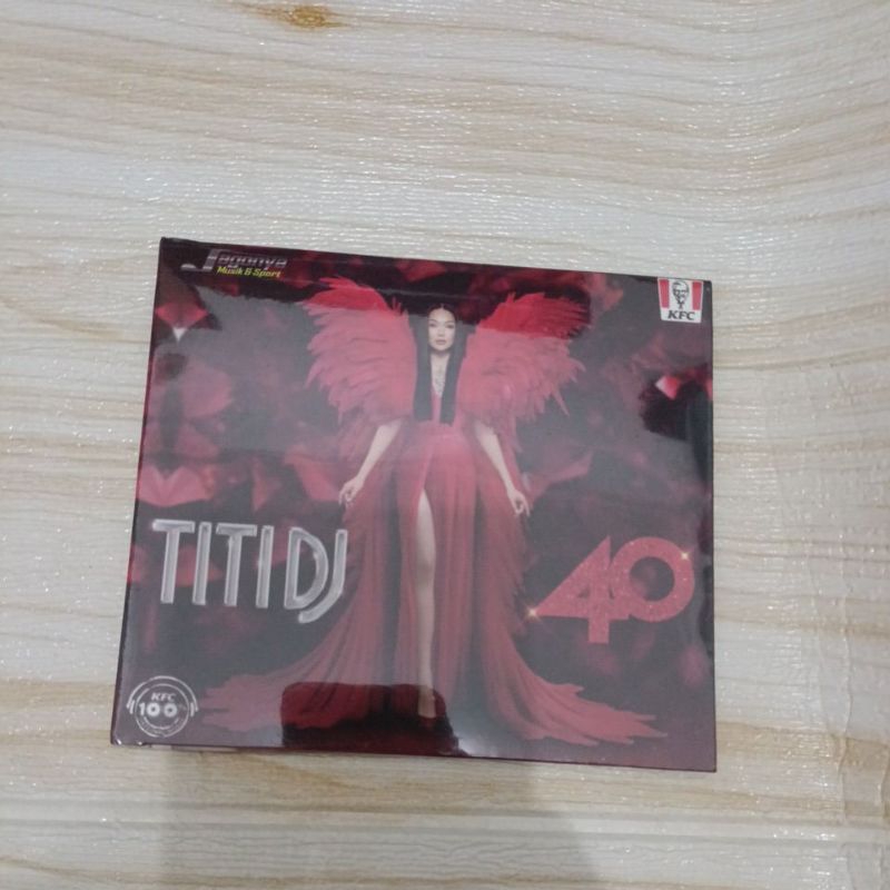 CD lagu TITI DJ dari KFC Segel