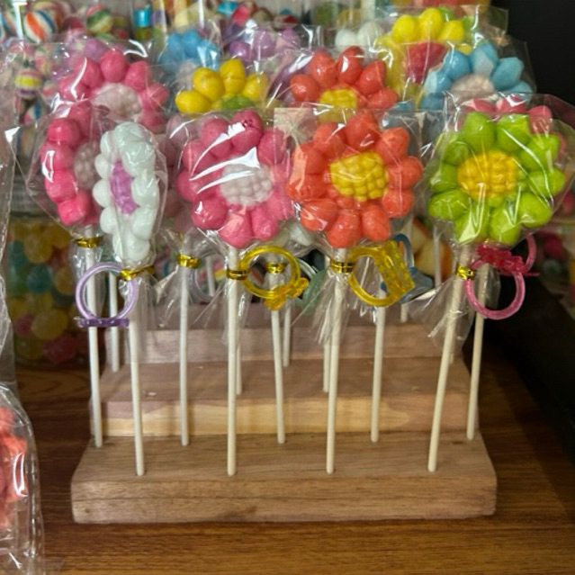 

PERMEN LOLI BUNGA MATAHARI CINCIN ISI 20 PCS GROSIR MURAH