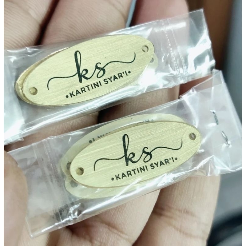 

costum label/label plat hijab/label plat besi