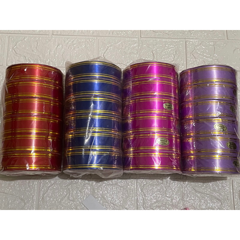 

PITA ROLL LIS EMAS +- 4 cm / pita roll lis emas / pita roll 4 cm