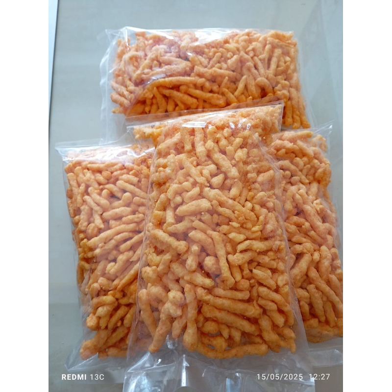 

Twist Corn Jagung Balado 25gr / Cheetos Balado Kiloan / Twist Jagung Balado