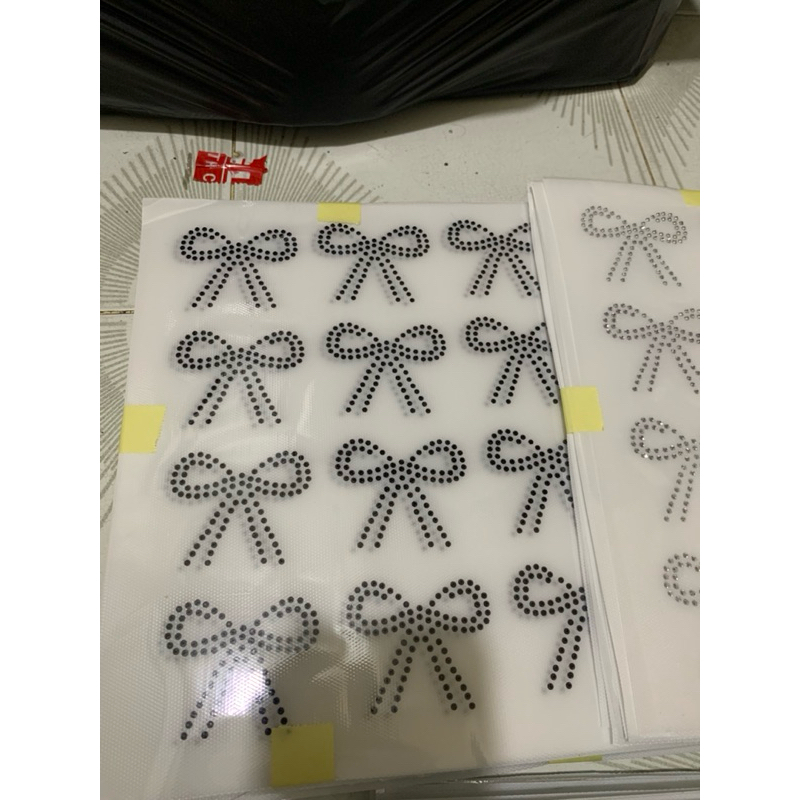 payet press mote gosok motif pita