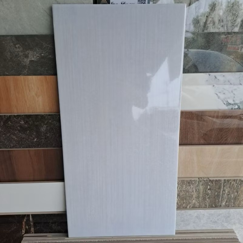 KERAMIK DINDING 30x60 TRAVINTE GREY MULIA
