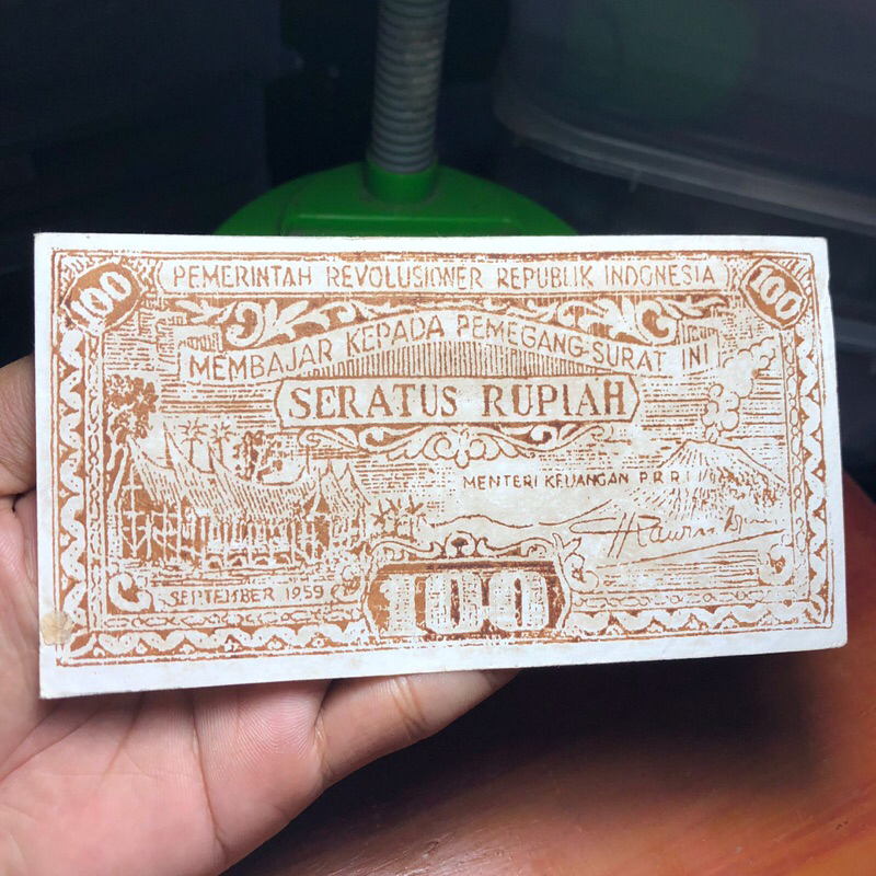 Uang Kuno Orida PRRI Rp. 100 Belakang terbalik