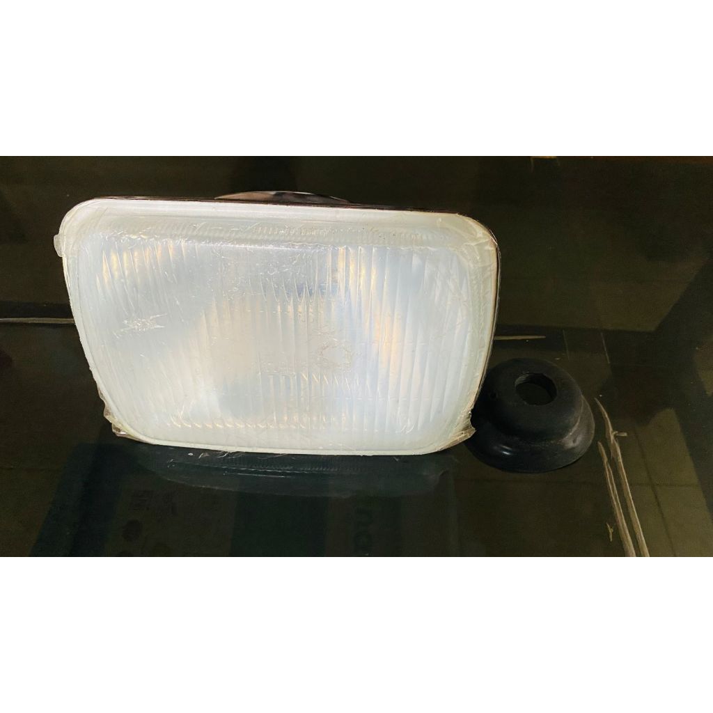 lampu depan L300 model halogen h4 bisa ganti bolam harga satuan