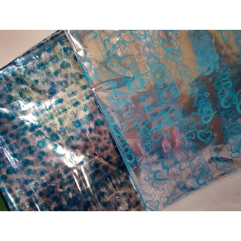 

plastik parcel,plastik kaca motif isi 10lembar