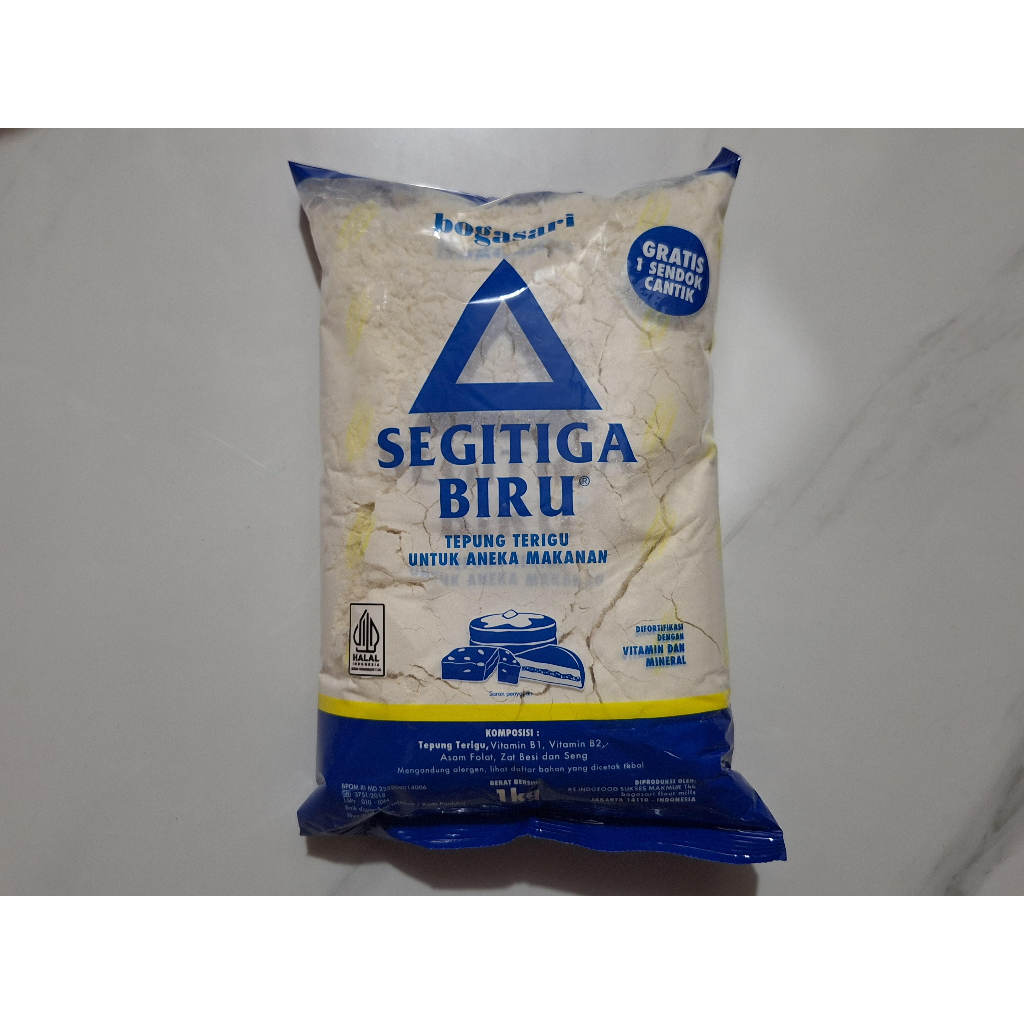 

Tepung Terigu Segitiga Biru Kemasan 1kg / Tepung Terigu
