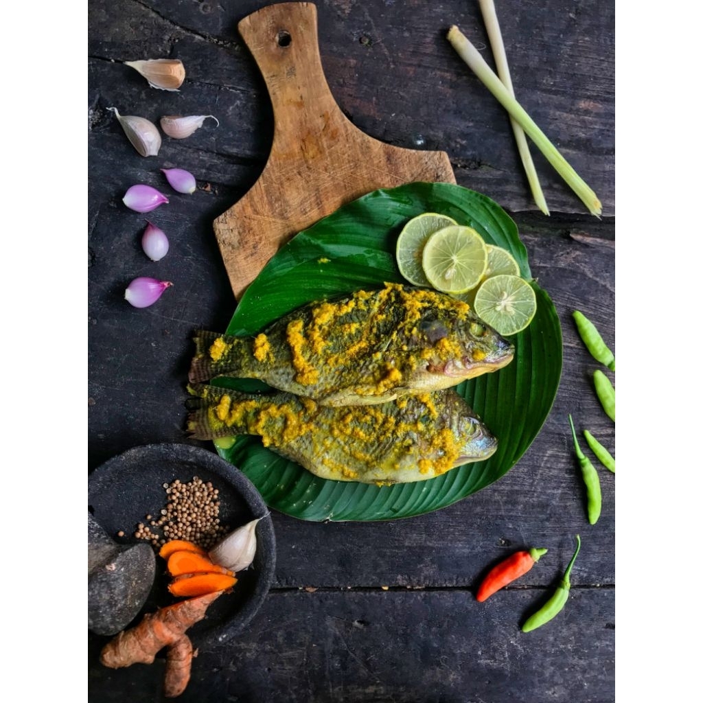 

frozen food ikan nila hitam beku bumbu kuning
