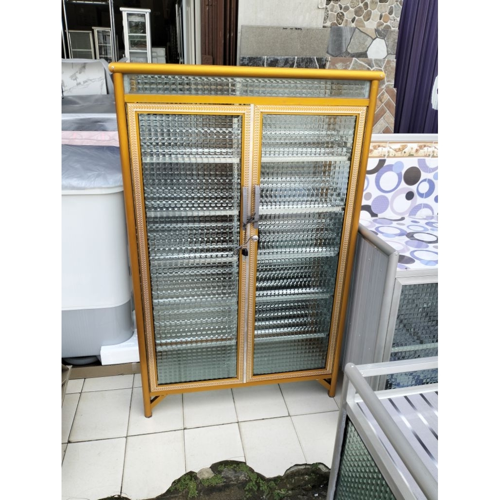 Lemari Sepatu aluminium gold