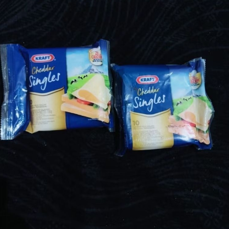 

Keju Cheddar Kraft Singles isi 10 lembar