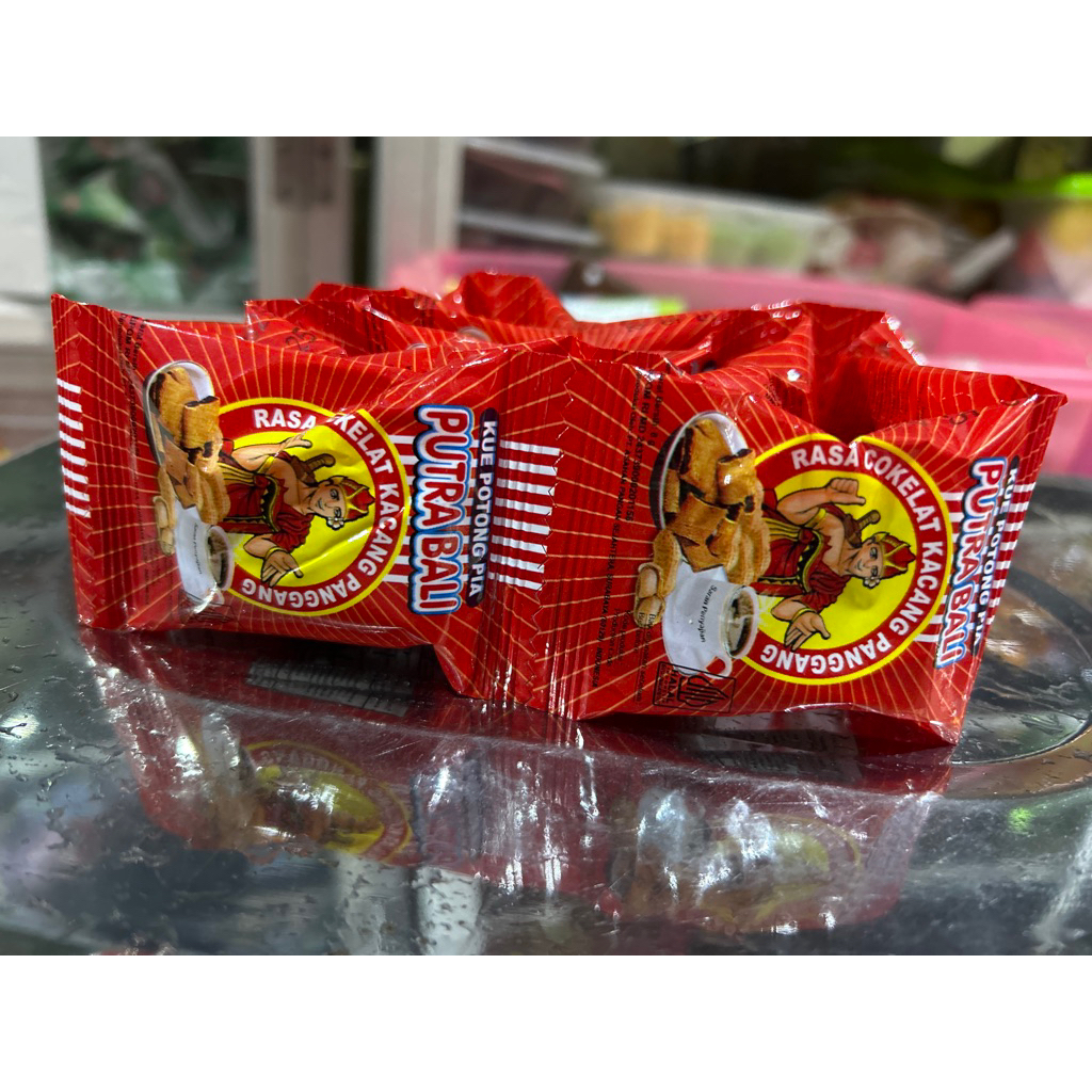 

PUTRA BALI KUE POTONG PIA RASA COKELAT KACANG PANGGANG ISI 10pcs