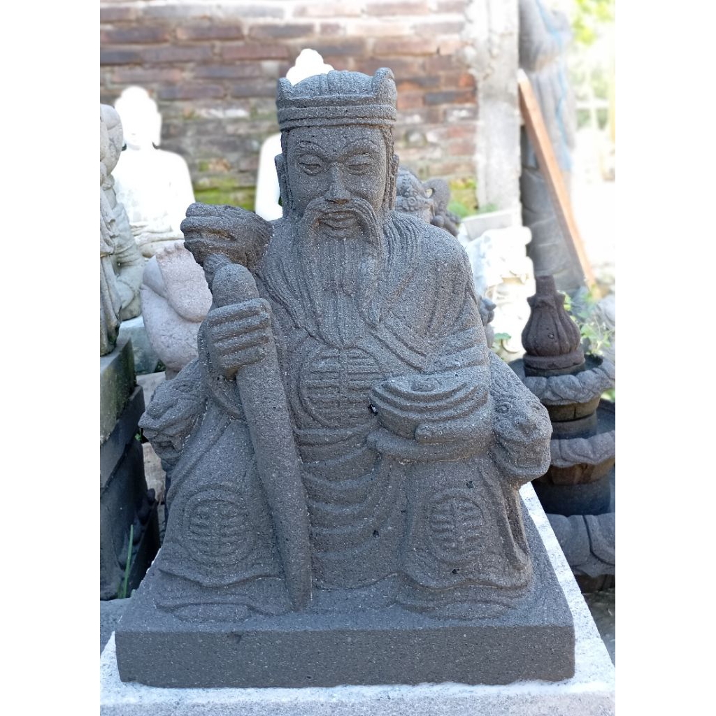 patung dewa batu lava merapi