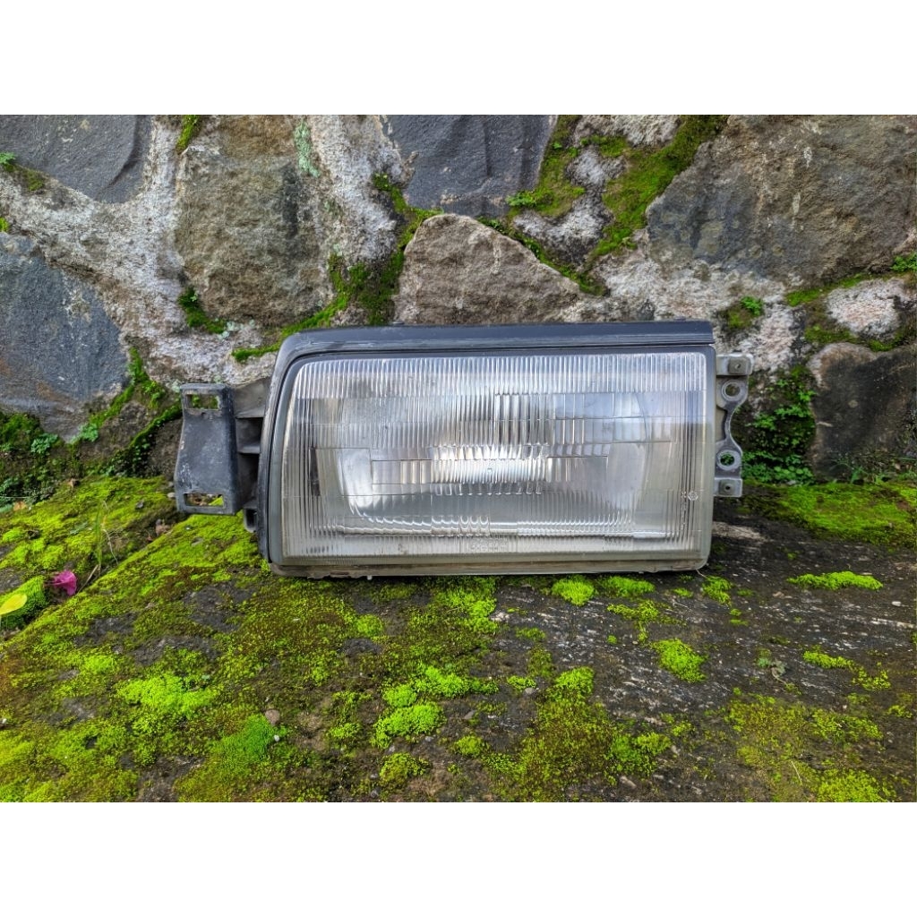 Headlamp Mazda 323 Elite Original