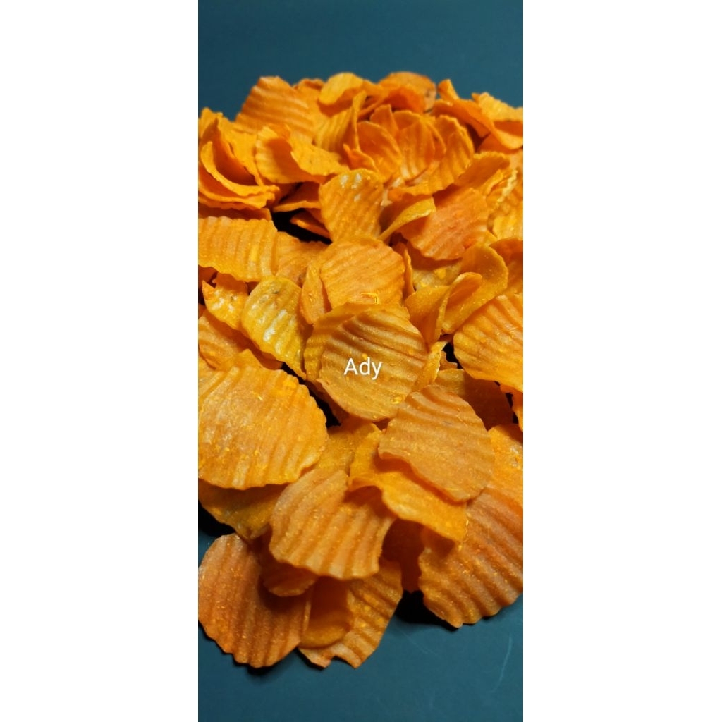 

Kerupuk Puyur Merah pedas manis ( Mentah ) kemasan 1 kg