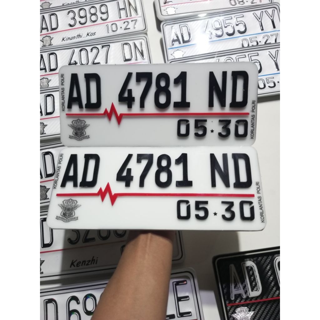 Plat Nomor Timbul