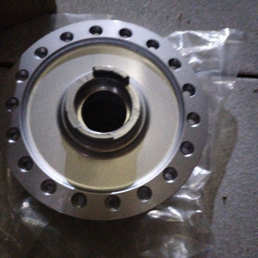 tromol depan revo absolute micro