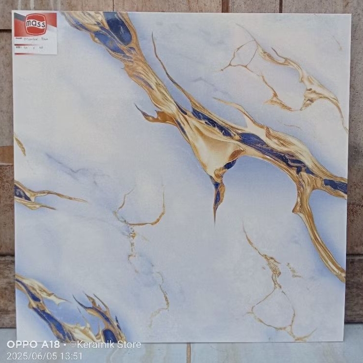 keramik 50x50 lantai putih corak gold biru marmer cutting