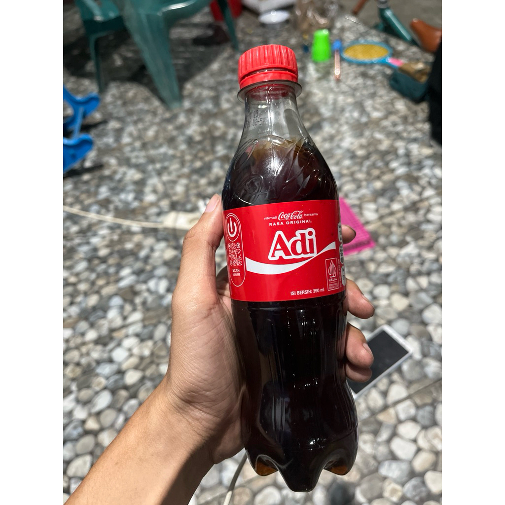 

Coca Cola 390ml tidak segel cuma diambil code dibalik tutup botolnya