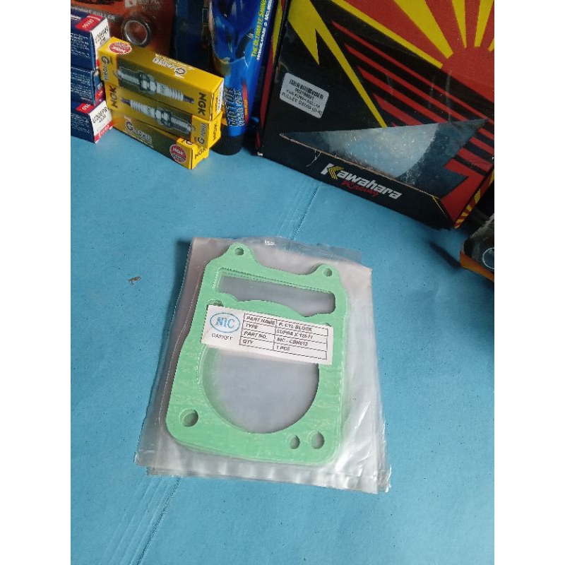 paking blok seher kertas supra x 125 fi.helm in